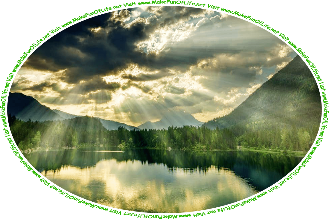 Picture of a mountain lake surrounded by green grass and evergreen trees, all under a sky of intensely bright sunrays streaming out from behind thick heavy dark clouds and the words, ‘Visit www.MakeFunOfLife.net.’