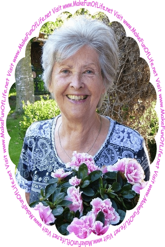 Picture of a woman holding a bouquet of flowers that have pink blossoms with a white fringe, and the words, ‘Visit www.MakeFunOfLife.net.’